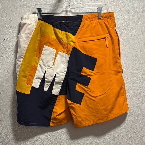 Supreme Big Letter Water Board Shorts with Bold Graphic Design